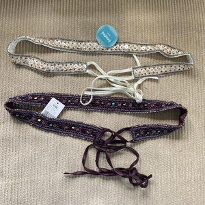 Two beaded belts.